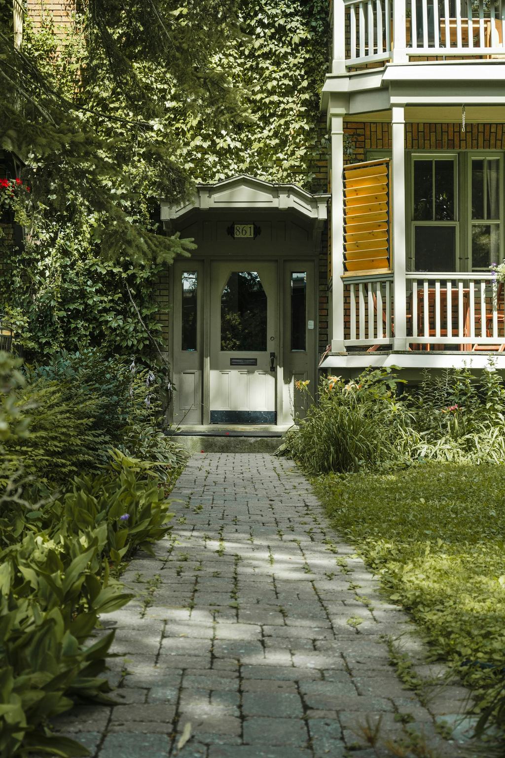 Brick walkway leading to a front porch