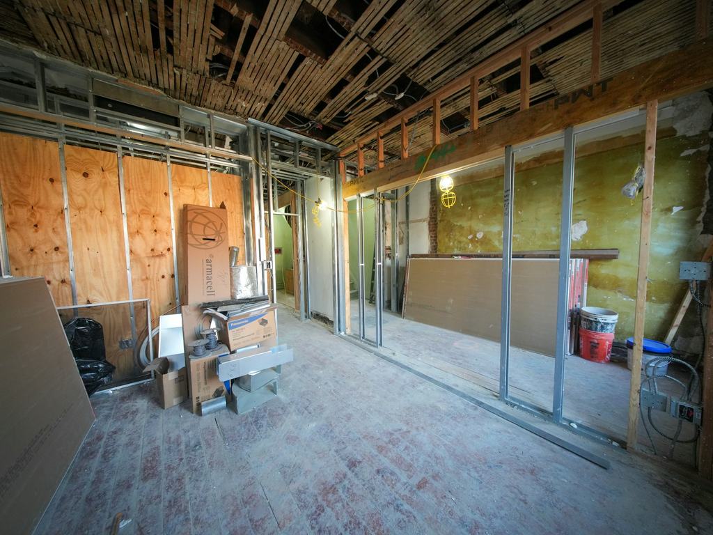 Commercial interior renovation with new framing and drywall