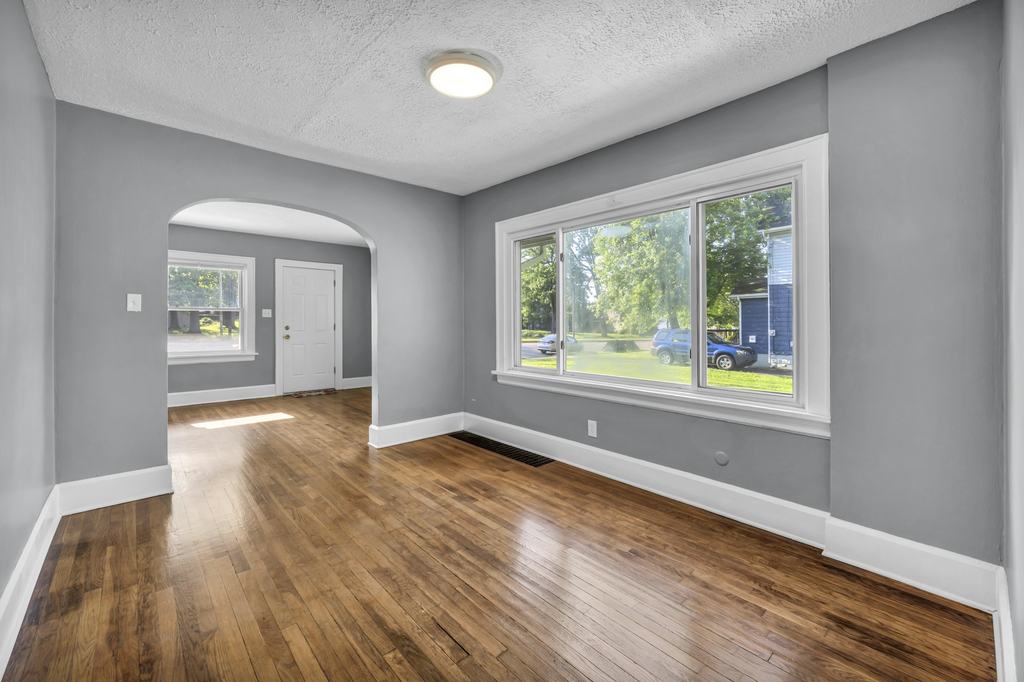 Freshly painted room with refinished hardwood floors