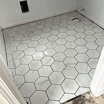 Hexagon tile floor installed in a bathroom