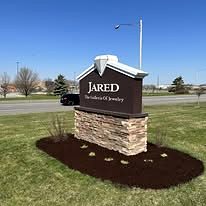 Monument sign with a new mulch bed and plantings