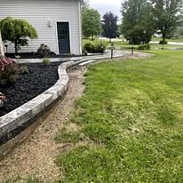Block edging along a mulch bed