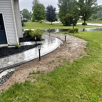 Curved bed edging along the lawn