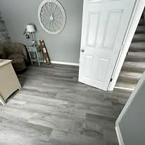 Bedroom with vinyl plank flooring